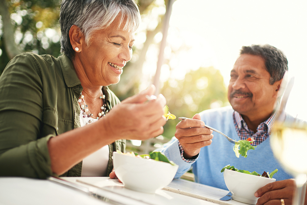 man and woman eating healthy