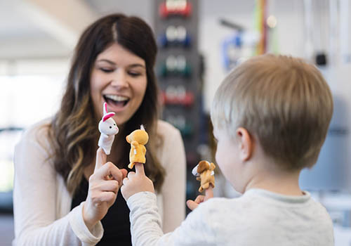 child life specialist working with child