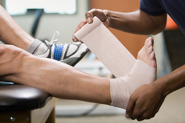 injured foot being wrapped