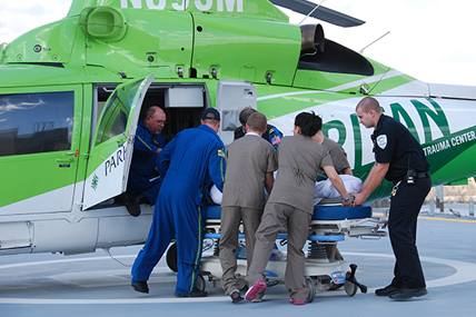 Patient being loaded into chopper