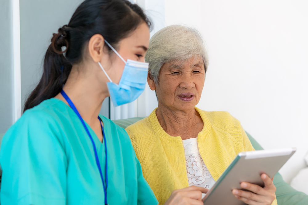 medical assistant with patient