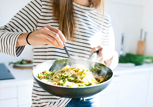 Person eating salad