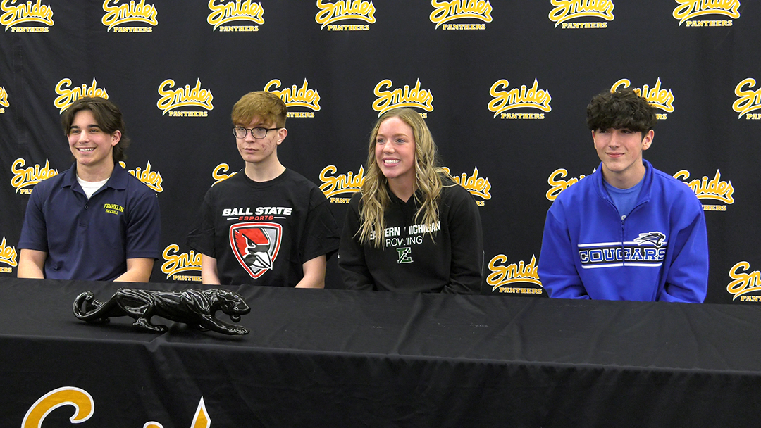 Four Snider seniors sign on to college athletic plans