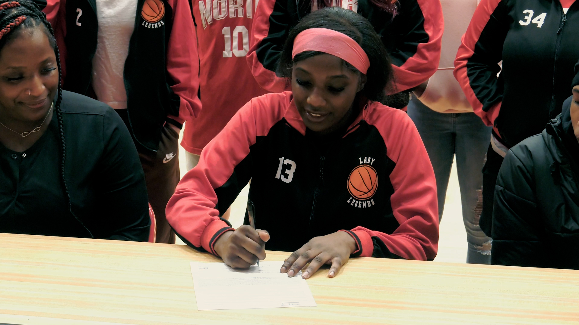 North Side's Aniya Woodson signs with Marian-Ancilla women's hoops