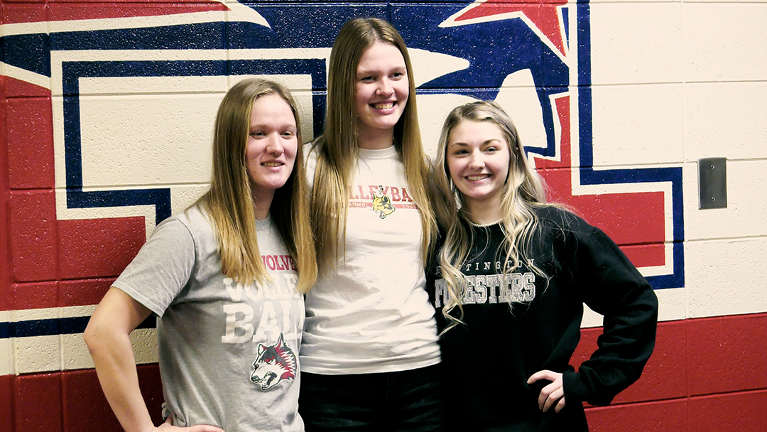 Heritage volleyball players make college choices official
